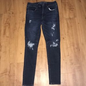 Distressed blue jeans